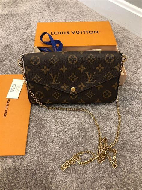 black louis vuitton bag with gold chain|Louis Vuitton wallet with chain.